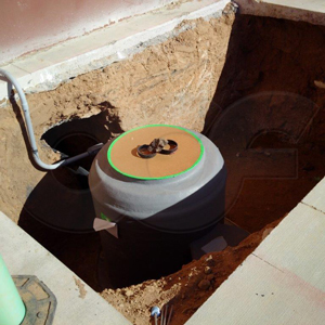 Packaged Metering Manhole installed on the concrete pad
