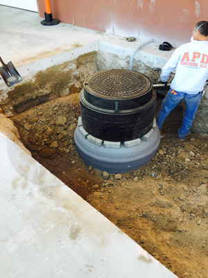 bringing the Packaged Metering Manhole installation up to grade thought the use of grade rings - frame - cover