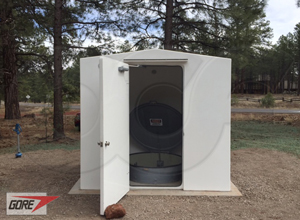 8 x 6 fiberglass shelter over a fiberglass Packaged Metering Manhole