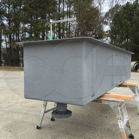 vertical discharge flange on a custom fiberglass weir box manufactured by Openchannelflow
