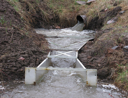 poor approach flume upstream of a Parshall Flume