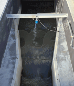 Ultrasonic sensor over a Parshall Flume at a WWTP headworks