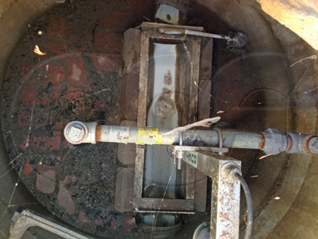 8-inch palmer bowlus flume in a concrete and brick manhole