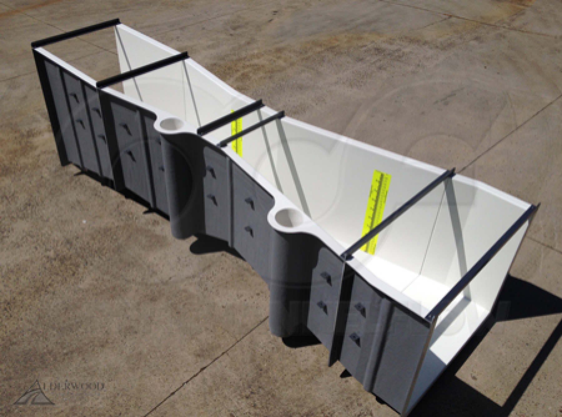 24-inch parshall flume with two stilling wells and custom end adapters