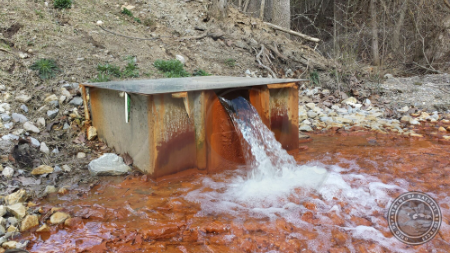 stainless steel weir box in Ohio measuring seepage through a dam