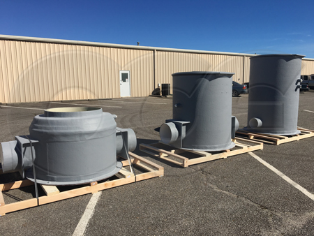 H-20 reducer - left - and Domed top fiberglass flow monitoring manholes