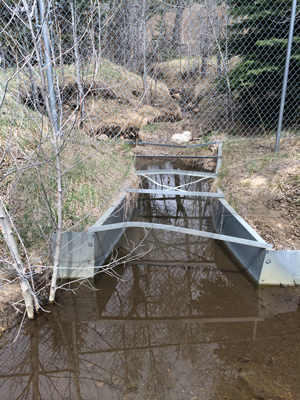 Earth embedded Parshall flume