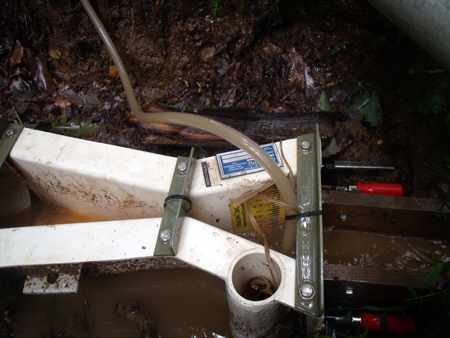 Adhesive Staff Gauge Failing on a Tracom Cutthroat Flume do to poor surface preparation