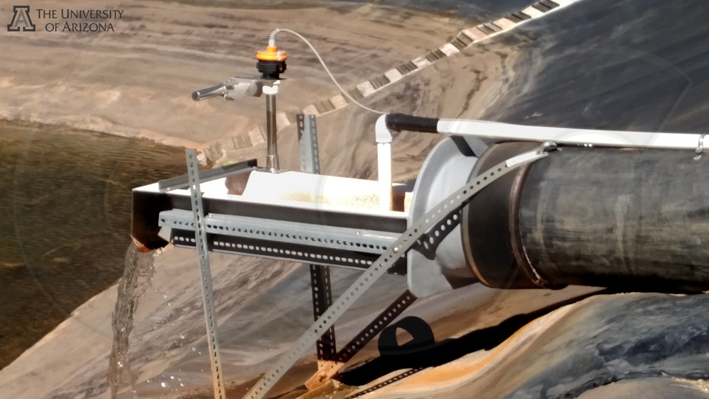 H flume measuring free-spilliing end-of-pipe flows into a lagoon