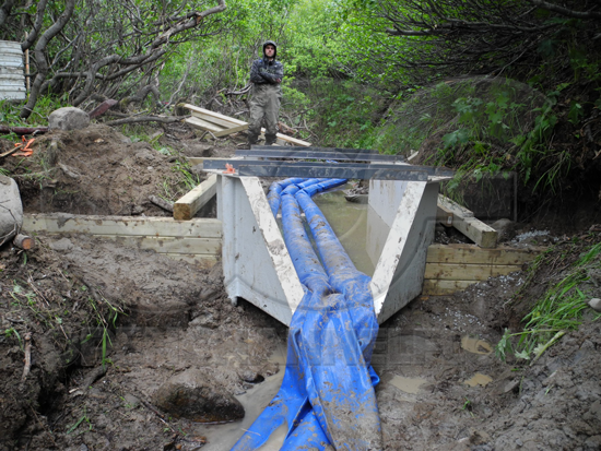 outlet of H flume undergoing installation in northern Canada
