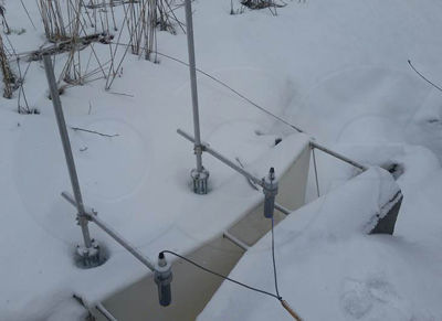 Cold weather flow measurement at Ha and Hb points in a Parshall flume