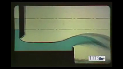 higher velocity flow over a thin plate weir - flow is now shooting downstream
