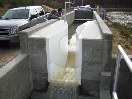 Low flow rate lagoon effluent measured in a fiberglass Parshall flume