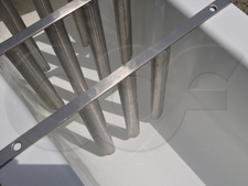 Close-up detail of Tranquilizer Racks being test fit into a Palmer Bowlus Flume