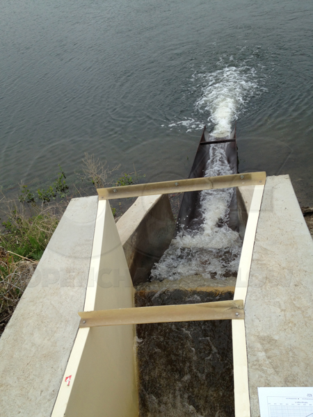 Custom discharge chute directing the effluent from a Parshall flume