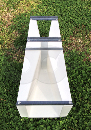 top view of a fiberglass 2-inch Parshall flume - the hourglass shape of the flume is clearly seen