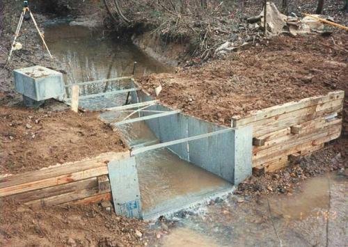 timber outlet wing walls on galvanized steel Parshall flume
