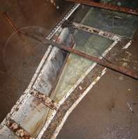 ultrasonic transducer measuring flow in a nested Parshall flume