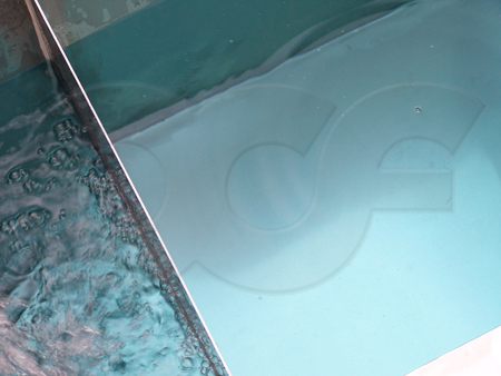 surface turbulence dampening with an underflow baffle in a weir box