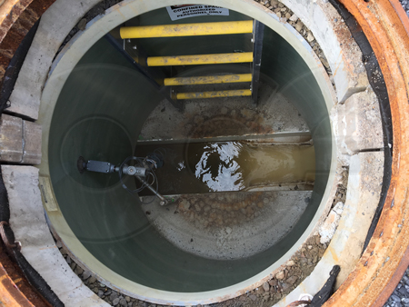 interior of a metering mahole where ultrasonic sensor is mounted upstream of Palmer-bowlus point of measurement