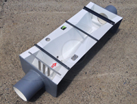 flow straightener mounted in the inlet end adapter of a Trapezoidal flume