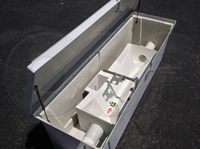 Large 60º Trapezoidal flume mounted in Openchannelflow fiberglass Redstone Enclosure